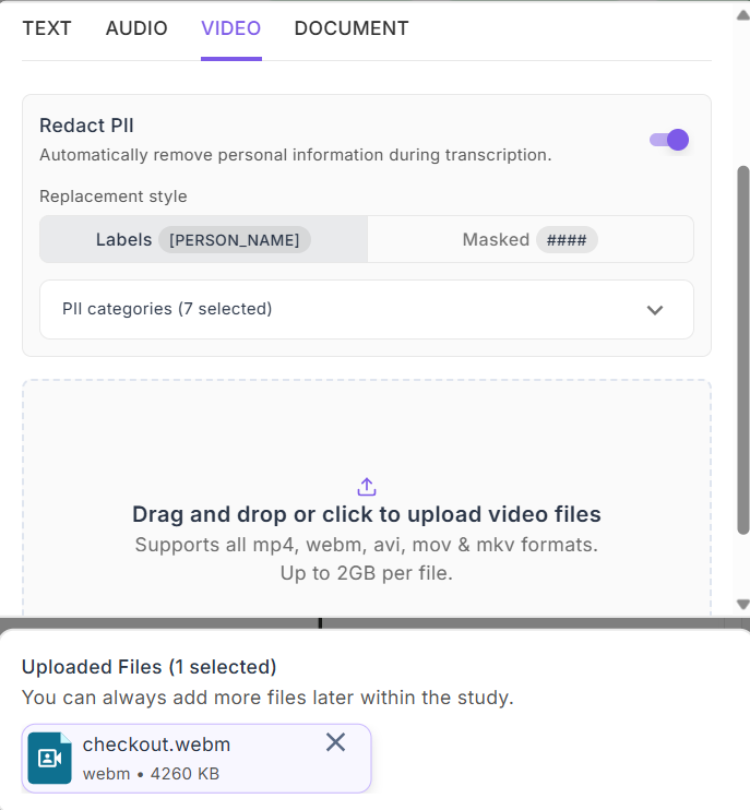 The Video tab with Redact PII enabled, showing the Labels and Masked replacement styles, the PII categories selector, the video drop zone, and one uploaded file